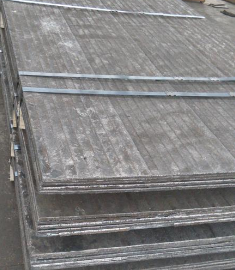 双金属堆焊耐磨板破解水泥生料磨耐磨难题的关键利器