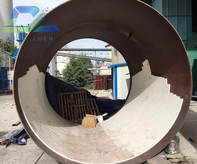 耐磨陶瓷片在矿山堆场下料管上的应用